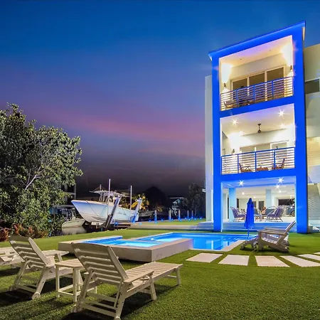 Villa Keys Casa - Elegant Waterfront Retreat, Sleeps 16, Elevator, Private Dock, Putt-Putt
